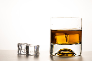 whiskey glass and whiskey