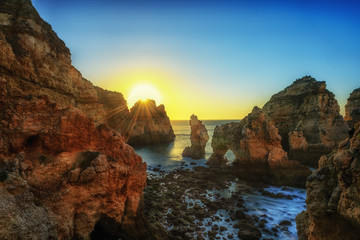 Sunset on beautiful coast of sea, Ponta da Piedade, Algarve, Portugal