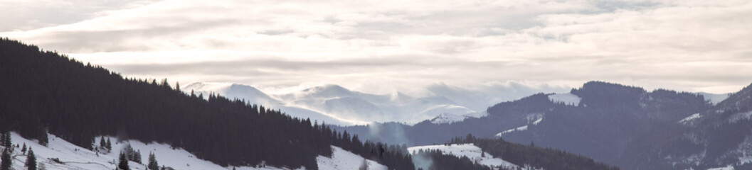 Fototapeta na wymiar Winter travel landscape in the mountains