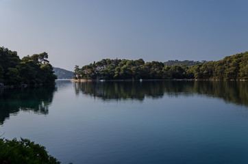 Naklejka na ściany i meble the big lake in the morning, seascape at mljiet island national park. big lake coast. croatia, dalmatia.