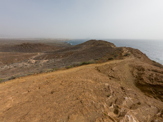 Spectacular coastal view of Playa Amarilla with desert landscape.