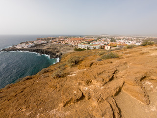 Fototapeta na wymiar Spectacular coastal view of Playa Amarilla with desert landscape.