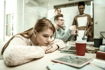 Beautiful student wearing nice accessories feeling sad and lonely
