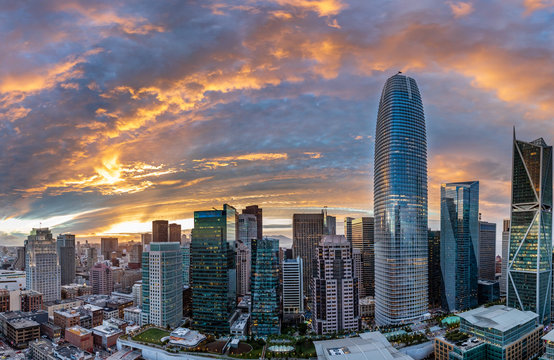 Sunset over San Francisco creates a orange and red halo over the city