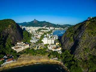 Town between two stone mountains. View between two mountains. City of Rio de Janeiro, Brazil, in the background, neighborhood of Urca and Botafogo. 
