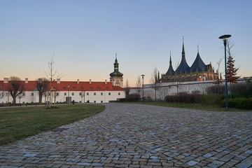 Naklejka premium Jesuit college in Kutna Hora in Czech republic, Europe with famous cathedral of Saint Barbara build in gothic style in sunset. City is member of world heritage Unesco.