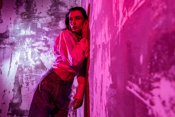 Nice stylish woman being photographed in studio