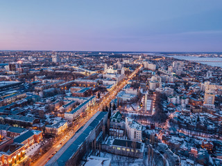 Fototapeta na wymiar Evening winter Voronezh downtown. Revolution prospect and historical center from drone 
