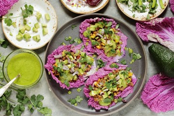keto diet taco food is wrapped instead of cakes in cabbage leaf of Peking cabbage with avocado mayo...