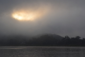 Sunrise Through The Fog