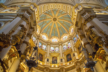 Fototapeta na wymiar Granada, Spain-October 15, 2017: Exquisite Interiors of landmark Granada Royal Cathedral
