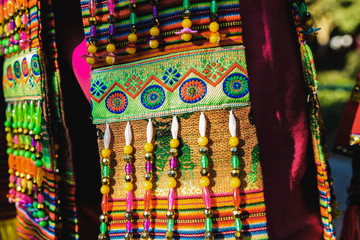 Detail of the colorful embroidery of a typical costume from the Andean folklore of Bolivia to dance the Tinku.