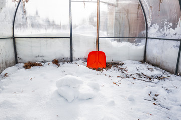 Polycarbonate greenhouse in winter. Western Siberia
