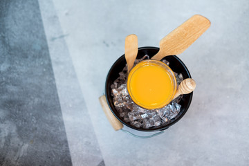 Obraz na płótnie Canvas Glass of freshly pressed orange juice