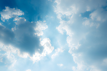 Naklejka na ściany i meble Blue sky and beautiful fluffy clouds in a sunny day.