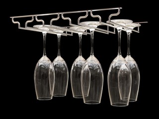 Wine glasses on the rack. Illustration on black background. 3d rendering.