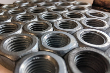 naturally view on a pile of steel nuts