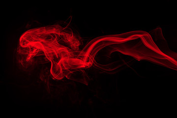 Red smoke abstract on black background. fire design