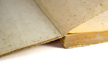  Old dusty yellowed book on a white background
