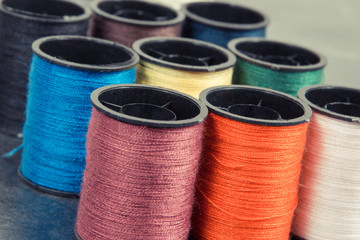 Colorful spools of thread. Accessories for needlework