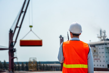 stevedore, loading master, port captain or supervisor in charge of command working on board the ship in port for safety loading discharging operation.
