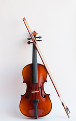 Fototapeta premium Violin in white background with bow