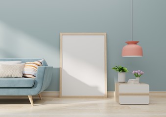 Interior poster mockup with vertical empty wooden frame standing on wooden floor with sofa and cabinet.3D rendering