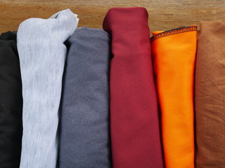 stack of shirts background,silk cloth texture