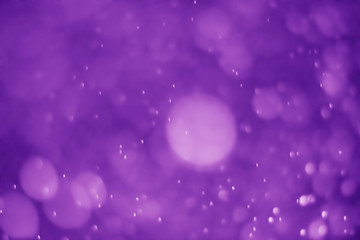 Fototapeta na wymiar Bokeh background abstract purple proton