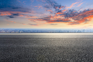 Empty asphalt road and modern city skyline with buildings in Shanghai,China