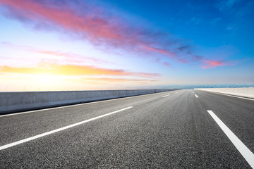 Empty asphalt road and modern city skyline with buildings in Shanghai,China