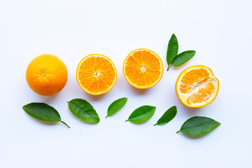 High vitamin C. Fresh orange citrus fruit with leaves isolated on white