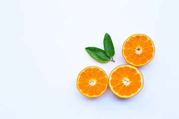 High vitamin C. Fresh orange citrus fruit with leaves isolated on white