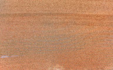 Rustic old burlap fabric texture background. The natural background of the old fabric of large...