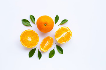 Fototapeta na wymiar High vitamin C. Fresh orange citrus fruit with leaves isolated on white.