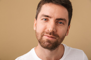 Obraz premium Close up portrait of a smiling young man