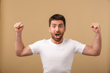 Portrait of a cheerful young man standing