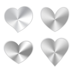 A collection of polished silver hearts for a romantic design for Valentine's Day, design cards for mother's day, March 8 and birthday.