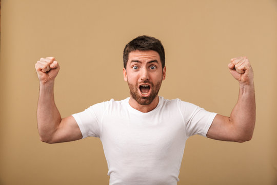 Portrait of a cheerful young man standing