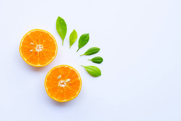 High vitamin C. Fresh orange citrus fruit with leaves isolated on white.