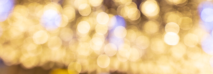 Obraz premium Golden bokeh lights as abstract background