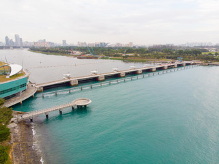 Fototapeta na wymiar Reservoir seperated from sea by a barrage 