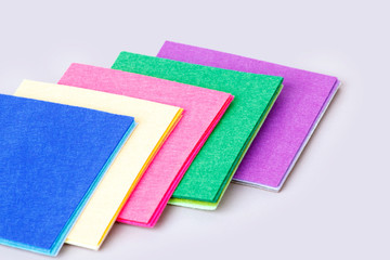 a set of colored sheets of felt, rainbow colors