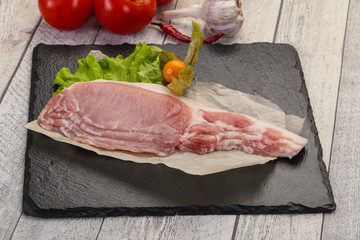 Raw pork bacon