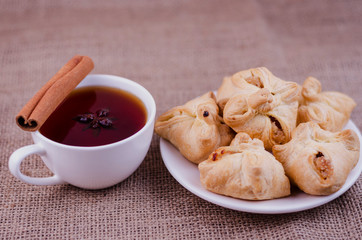 Apple pie and tea with anise and cinnamon