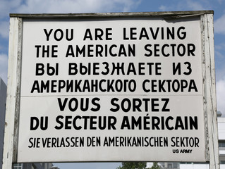 Berlin Germany Check Point Charlie and the text in American Russian French and German Language