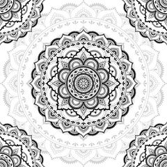 Seamless decorative ornament in ethnic oriental style. Circular pattern in form of mandala for Henna, Mehndi, tattoo, decoration.