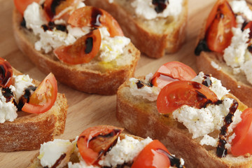 Sandwisches with tomatoes, homemade cheese. olive oil and balsamic souce	