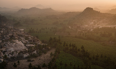 hampi view from matanga hill at sunrise over the achyutaraya temple india karnakata mystical sky