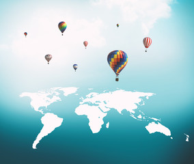 Balloons flying over world map.